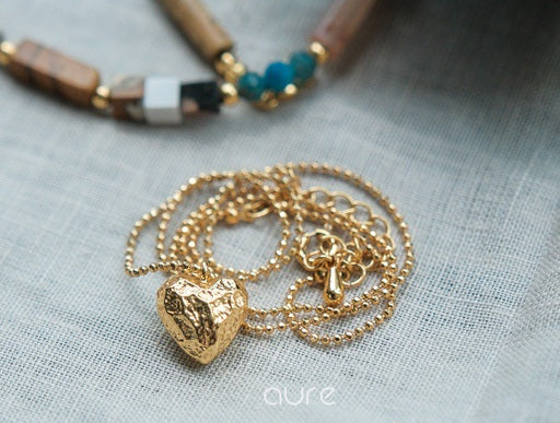 Gold heart necklace-close-up-natural light