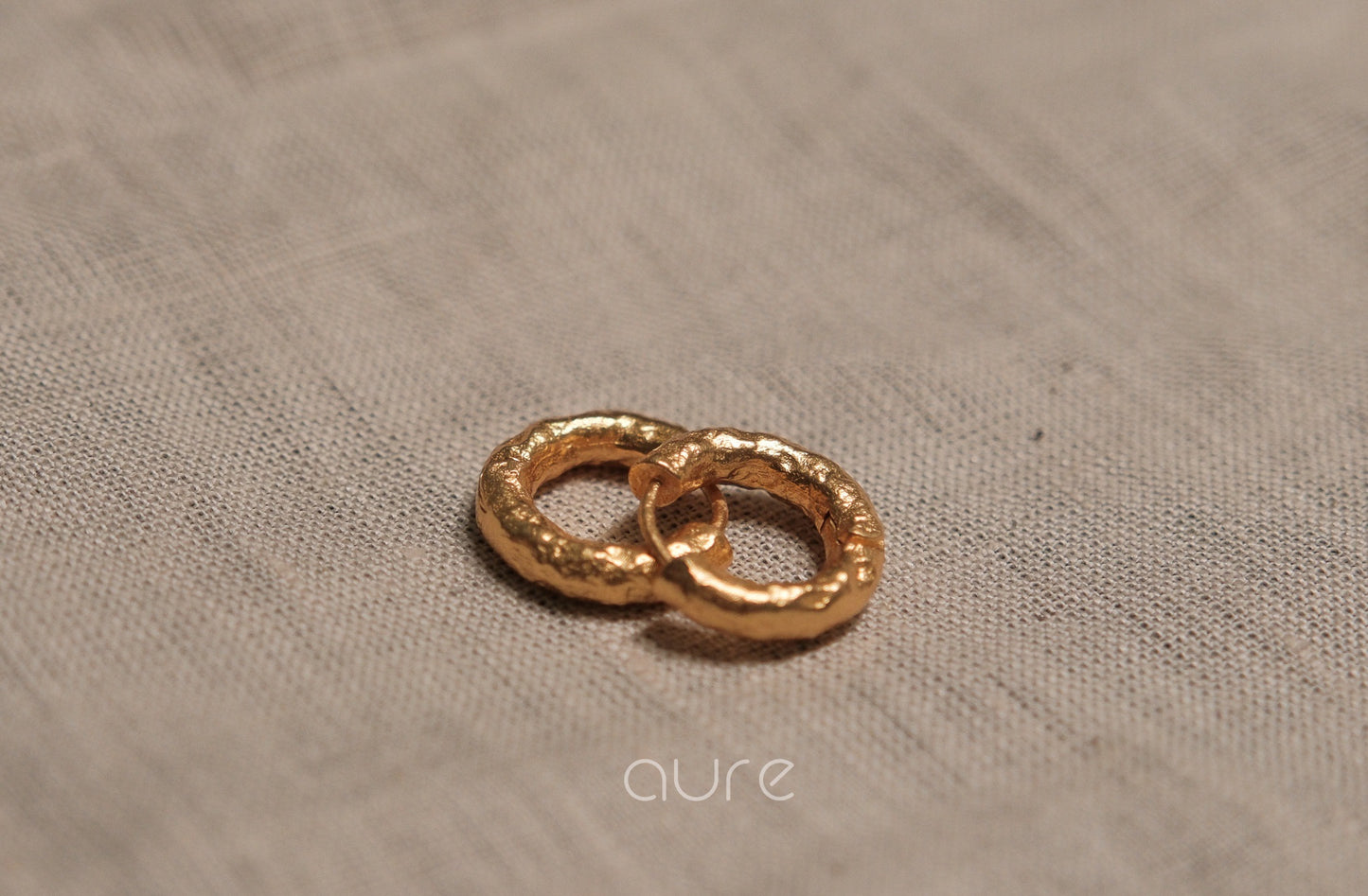 Simple gold earring handcrafted hammered texture