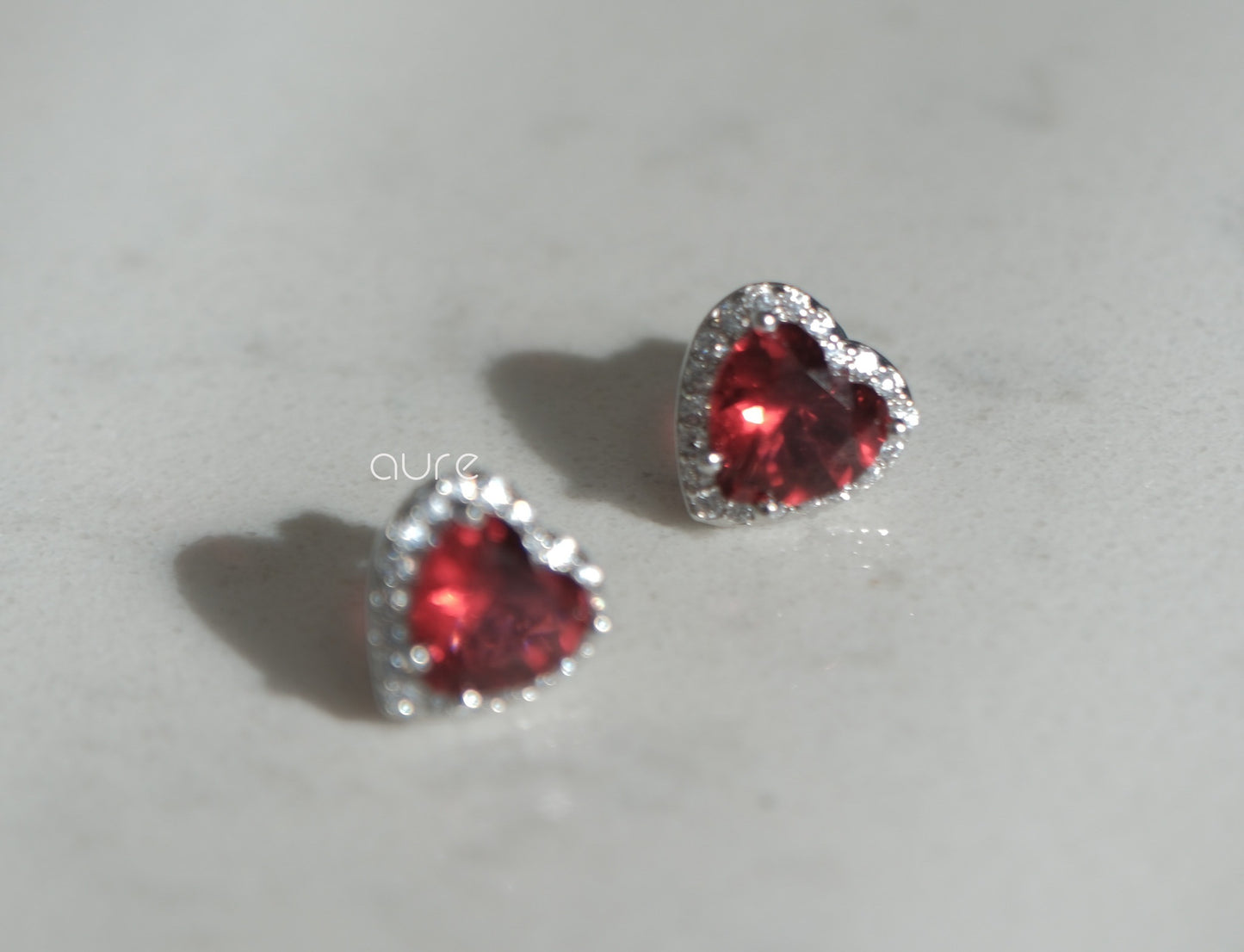 Heart-shaped ruby earrings-left side