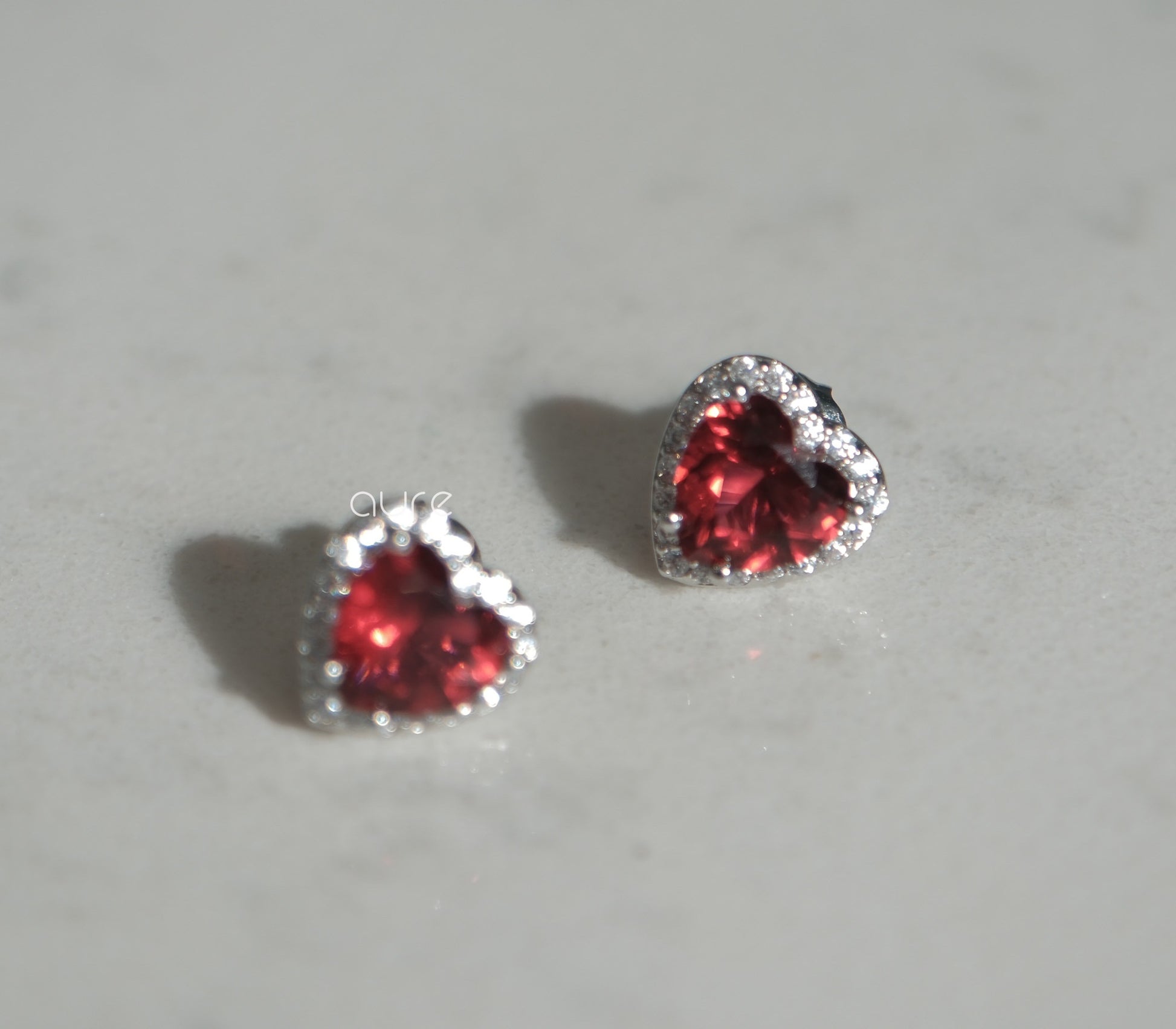 Heart-shaped ruby earrings-close up