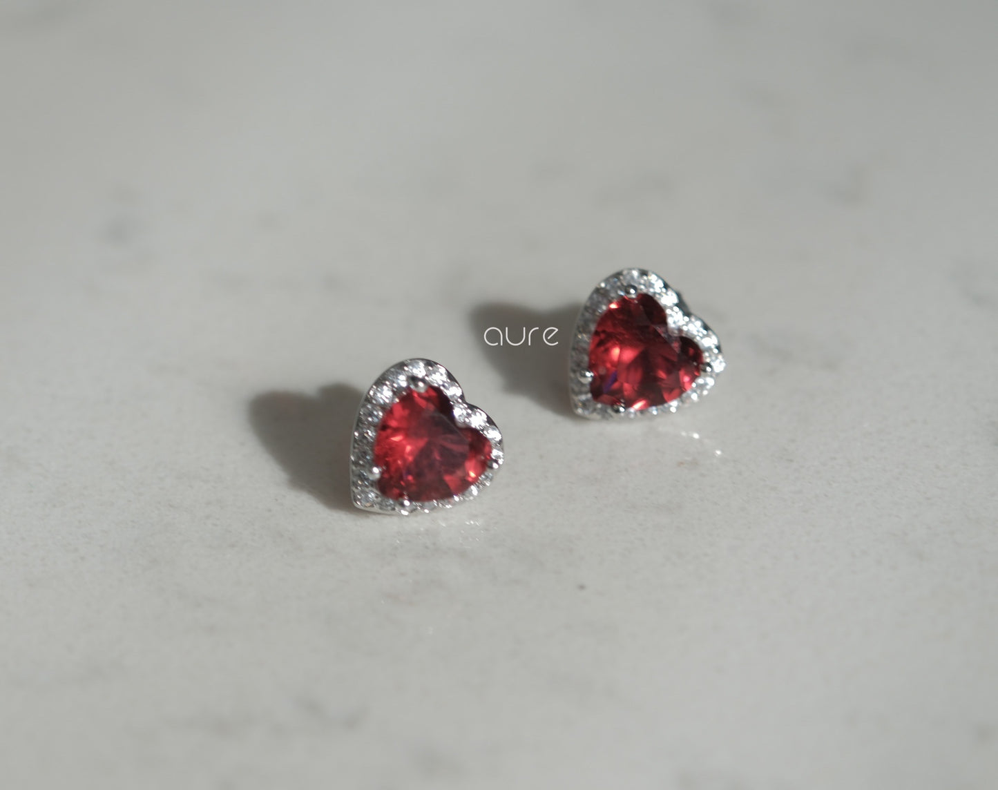 Heart-shaped ruby earrings-close up