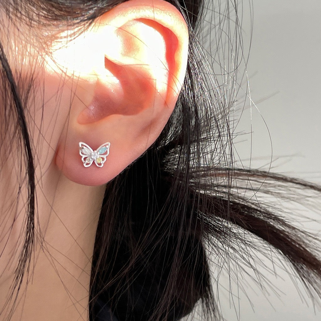 Small Butterfly Stud Earrings sterling silver on model