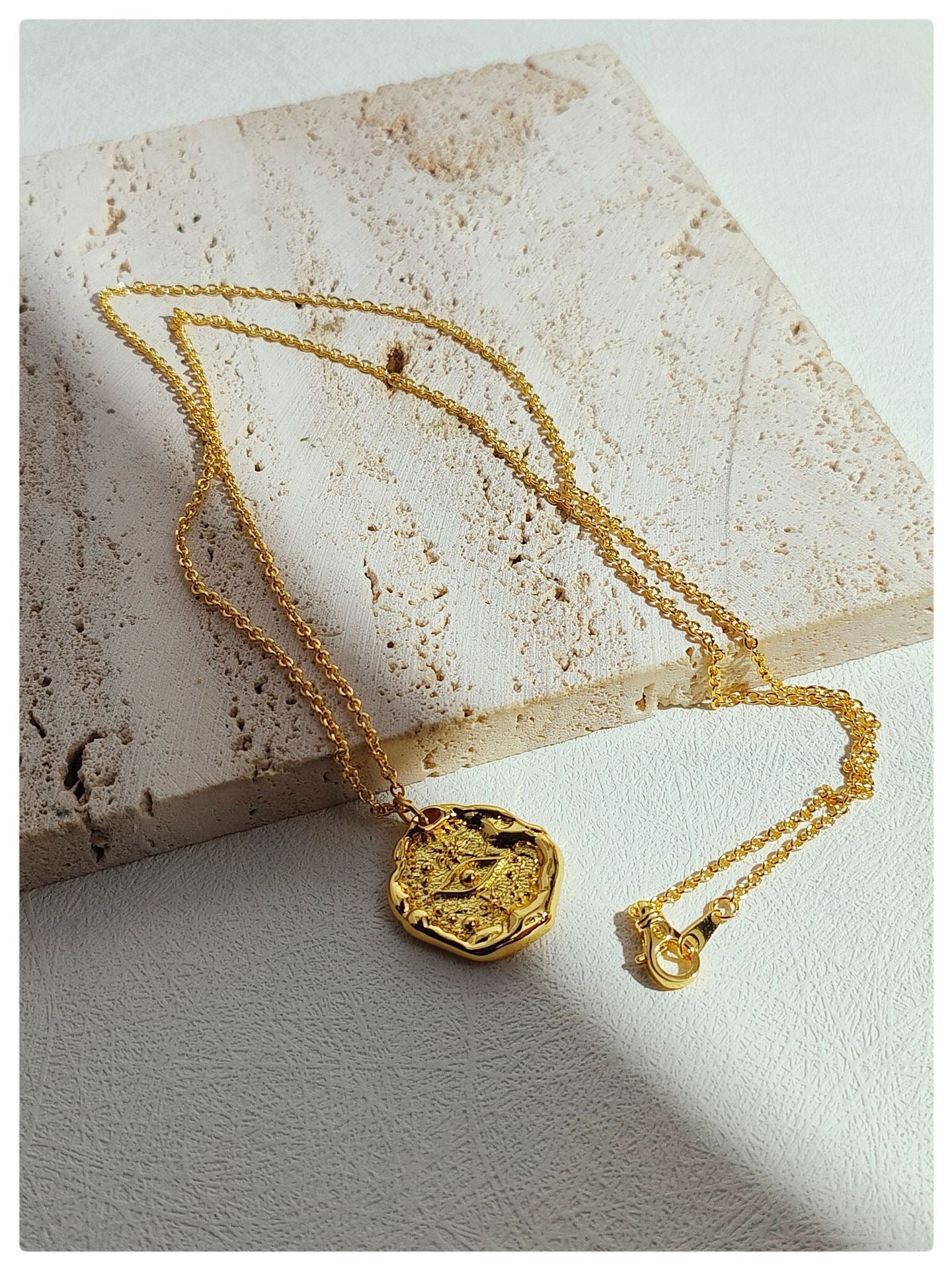 Powerful Gold Evil Eye necklace