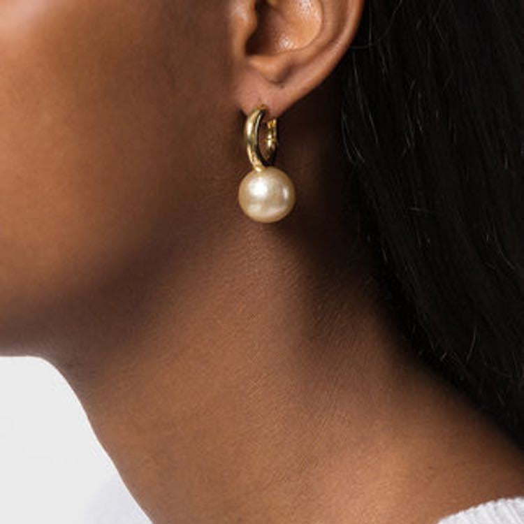 Contemporary Pearl Dangle Hoop Earrings on model